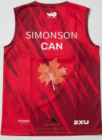 Red sports jersey with a maple leaf and branding on a light gray surface